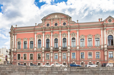 Fototapeta na wymiar Buildings on waterfront of St. Petersburg summer day, Russia
