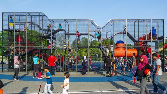 4K Time lapse of kids at Taman Tasik Titiwangsa park, Kuala Lumpur, Malaysia.