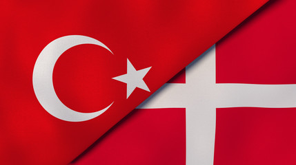 The flags of Turkey and Denmark. News, reportage, business background. 3d illustration