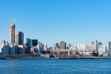 Obraz premium Midtown Manhattan Skyline along the East River in New York City with the Queensboro Bridge