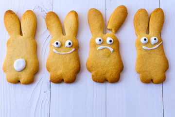 Easter bunnies. Gingerbread easter cookies in shape of bunny on a white background