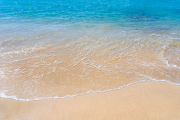 Fototapeta na wymiar beautiful ocean wave on sandy beach. Background.