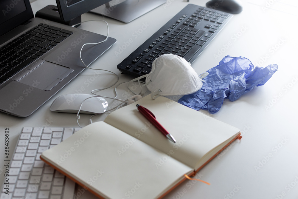 Fototapete medical mask and gloves on the desktop. remote work and study. notepad with place for text and pen f