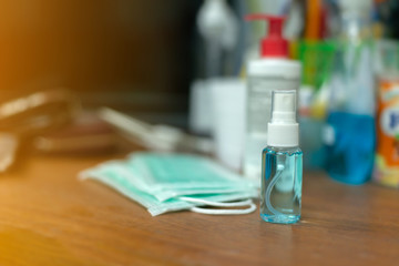 Coronavirus prevention medical surgical masks and hand sanitizer gel for hand hygiene corona virus protection.Healthcare concept.