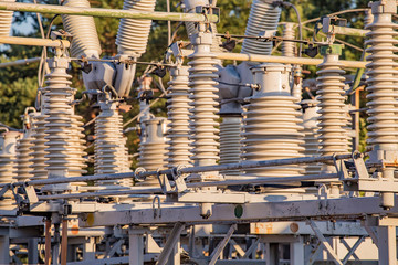 High voltage electrical substation Closeup on wiring, connections and insulators of a electrical substation.