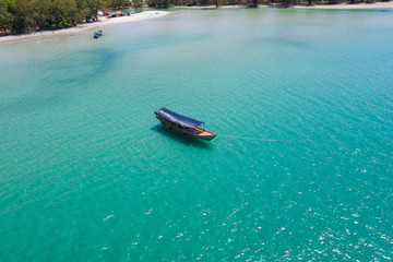 Traditional boat at sunset on Otres Beach, Sihanoukville, Cambodia