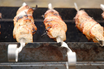 frying meat on the grill. Spring in Russia.