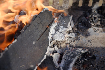 set firewood for frying meat. In spring, in Russia.