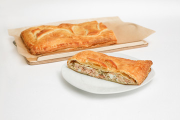 a piece of fish pie on a white background