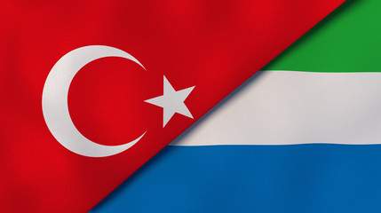 Obraz premium The flags of Turkey and Sierra Leone. News, reportage, business background. 3d illustration