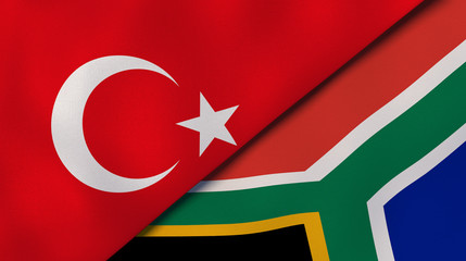 The flags of Turkey and South Africa. News, reportage, business background. 3d illustration