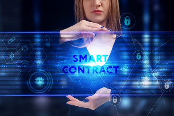 Business, Technology, Internet and network concept. Young businessman working on a virtual screen of the future and sees the inscription: Smart contract