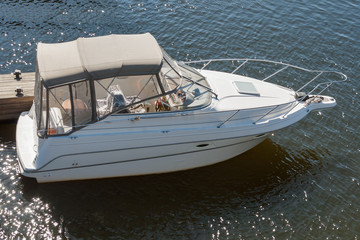 Luxury boat moored on a sunny day view from above.