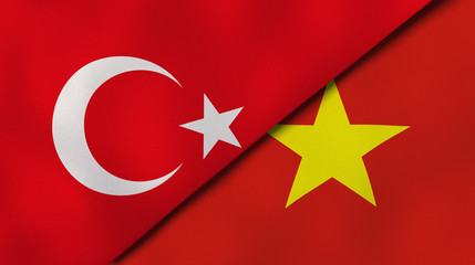 The flags of Turkey and Vietnam. News, reportage, business background. 3d illustration