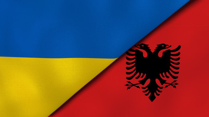 The flags of Ukraine and Albania. News, reportage, business background. 3d illustration