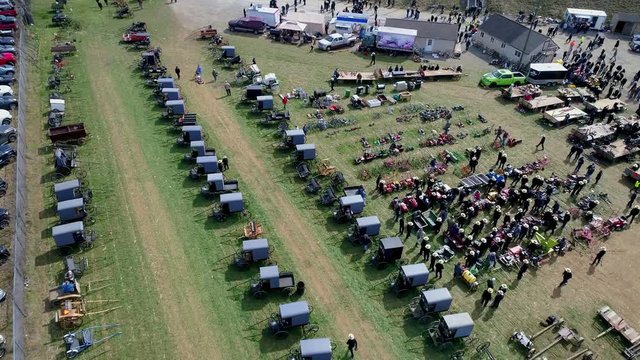 Aerial View of an Amish Mud Sale Auctioning Buggies, Farm Equipment to Quilts on a Winter Day