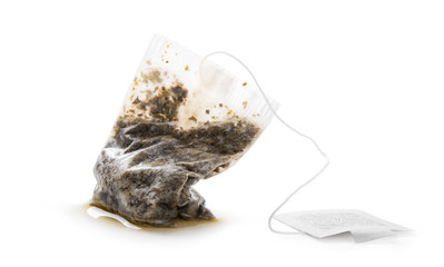Used tea bag isolated on white background.