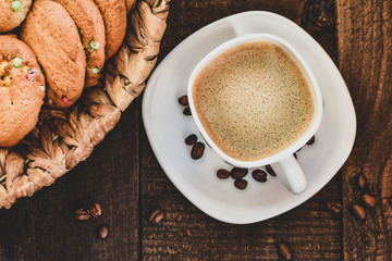 cup of coffee with cookies