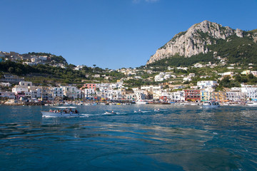 Fototapeta na wymiar Marina Grande Harbor in the City of Capri, an Italian island off the Sorrentine Peninsula on the south side of Gulf of Naples, in the region of Campania, Province of Naples, Italy, Europe