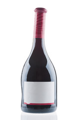 Red wine bottle close up on white background