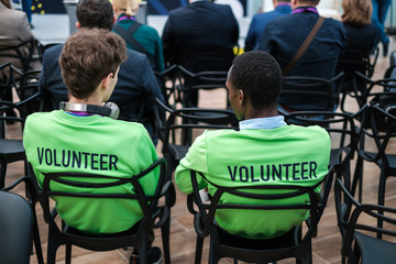 Female volunteer working at educational event