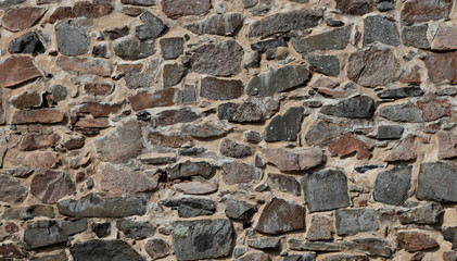 Medieval stone wall for background. Horizontal.