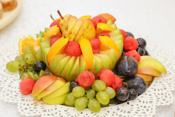 Decorated vegetables on table prepared for wedding guests