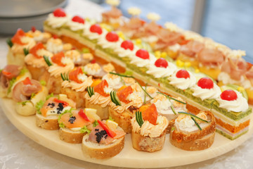 Decorated food on table prepared for wedding guests