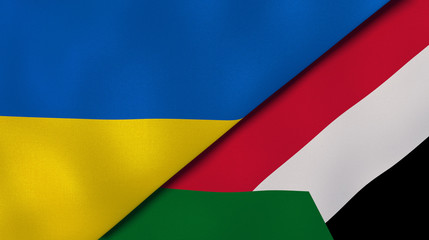 The flags of Ukraine and Sudan. News, reportage, business background. 3d illustration
