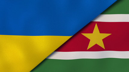 The flags of Ukraine and Suriname. News, reportage, business background. 3d illustration