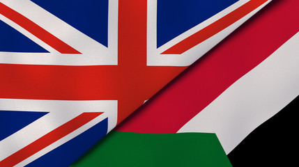 The flags of United Kingdom and Sudan. News, reportage, business background. 3d illustration