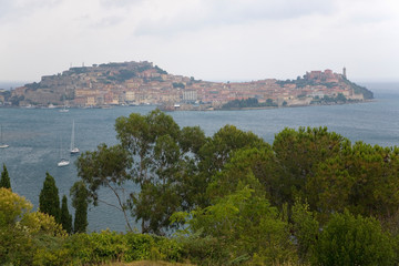 Fototapeta na wymiar Water view of Portoferraio, Province of Livorno, on the island of Elba in the Tuscan Archipelago of Italy, Europe, where Napoleon Bonaparte was exiled in 1814
