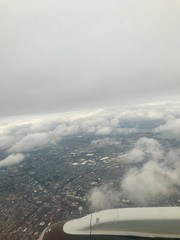 Obraz premium Aerial birds eye view of Elizabeth & Newark, New Jersey (United States of America) close to EWR airport: Urban downtown, highway & turnpike transportation, busy industrial cityscape around the port