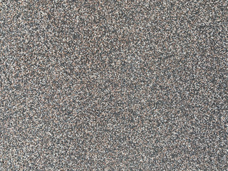 dark gray grainy stone background. grain stone texture. abstract pattern. wallpaper stone texture