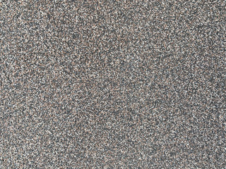 dark gray grainy stone background. grain stone texture. abstract pattern. wallpaper stone texture