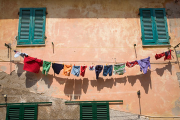 Colorful laundry hanging on clothing line in Portoferraio, Province of Livorno, on the island of Elba in the Tuscan Archipelago of Italy, Europe