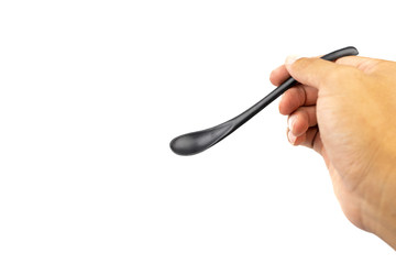 a spoon for scooping chemicals used in a lab.