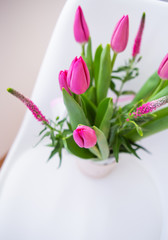 Beautiful fresh bright pink tulips, place for text.