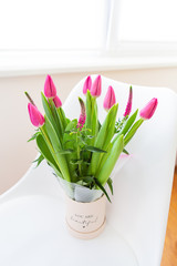 Fresh pink tulips, closeup. Bouquet, a beautiful gift.