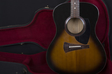 Obraz na płótnie Canvas Part of acoustic guitar. Guitar lying in the case