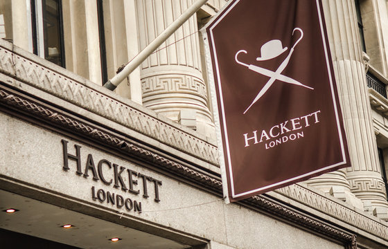 LONDON- APRIL, 2018: Hackett London fashion store exterior logo on Bond Street, a luxury British fashion brand