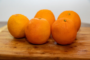 Oranges on a cutting board