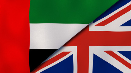 The flags of United Arab Emirates and United Kingdom. News, reportage, business background. 3d illustration