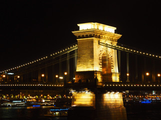 View of the Szechenyi Chain Bridge at night in Budapest, Hungary.