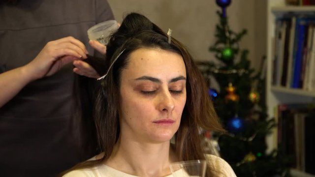 A girl drinks champagne at a stylist's reception