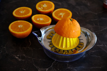 Orange Juice, Vitamin C Boost, Freshly hand juiced fruit juice. Half cut oranges. Healthy lifestyle