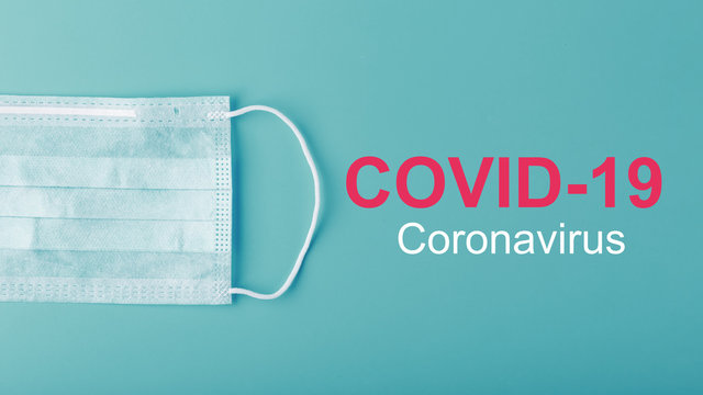 Medical masks for protection against dangerous coronavirus infection with the inscription COVID-19.