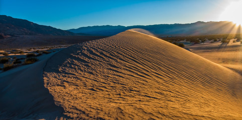Sunset Over The  Mesquite Flat Sand Dunes With The Panamint Range, Death Valley National Park, California, USA