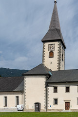 Fototapeta na wymiar View of the Catholic monastery of Ossiach on Lake Ossiach, Austrian Alps