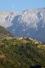 Mountain village with Pyrenees Mountains in background near La Seu d'Urgell, Cataluna, Spain, Europe